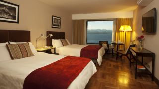 Family Plan with Lake View Fully refurbished rooms that bring out Patagonian tradition and warmth. 27m2 of the utmost comfort with an exclusive view of the Nahuel Huapi Lake.